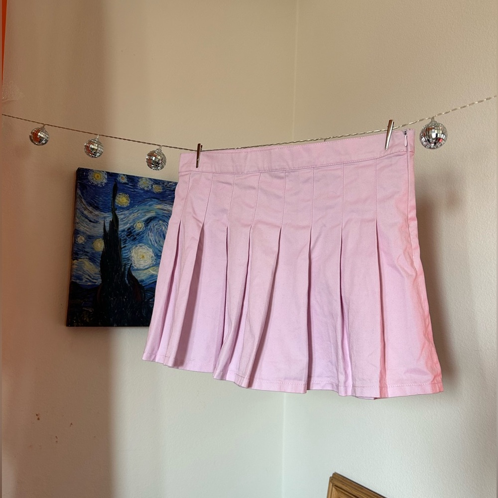 Pink denim pleated mini skirt